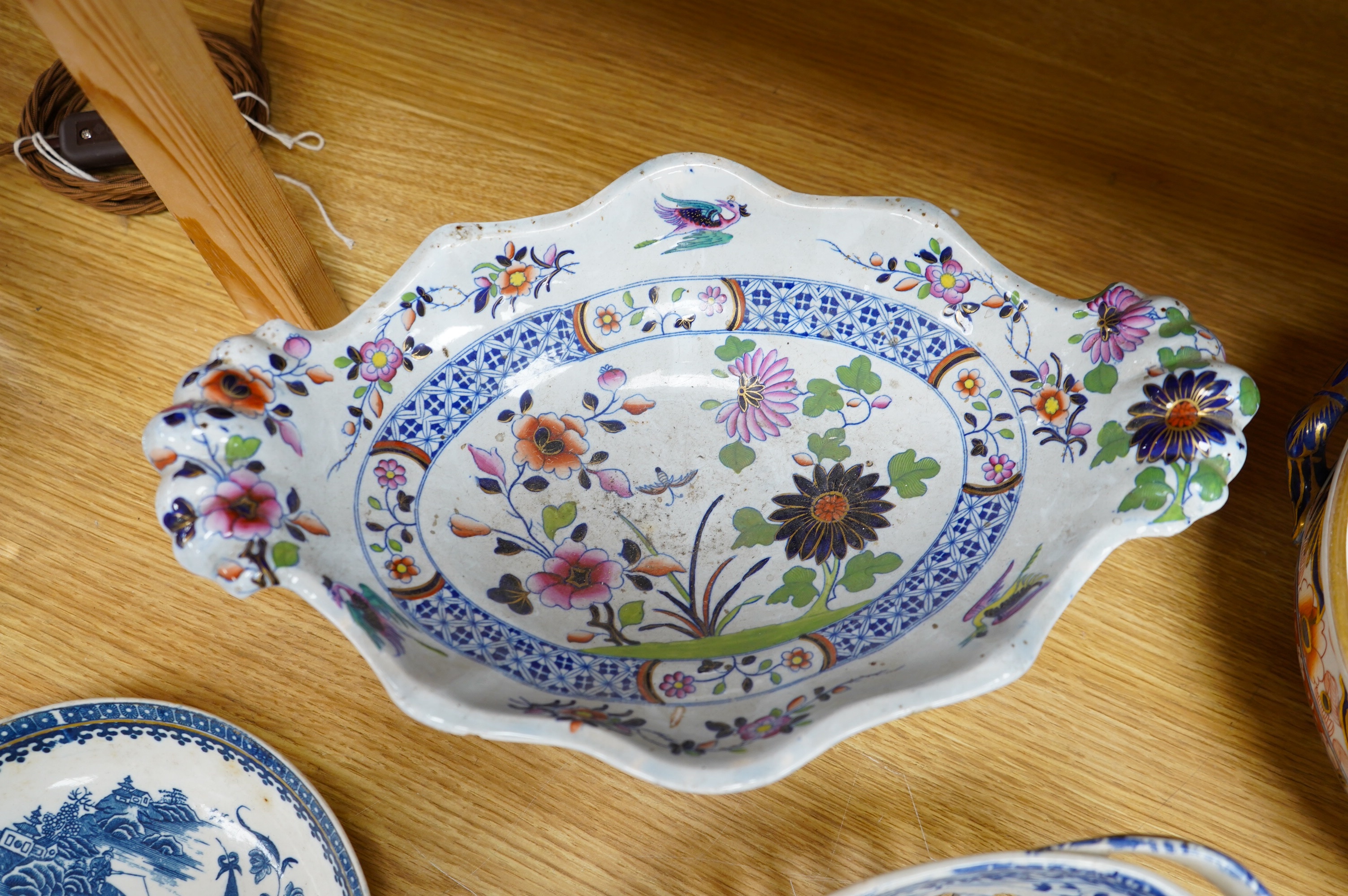 A Spode blue and white oval basket, a Spode two-handled pedestal dish, a Caughley Fisherman pattern saucer dish and two other items, largest 38cm wide. Condition - varies